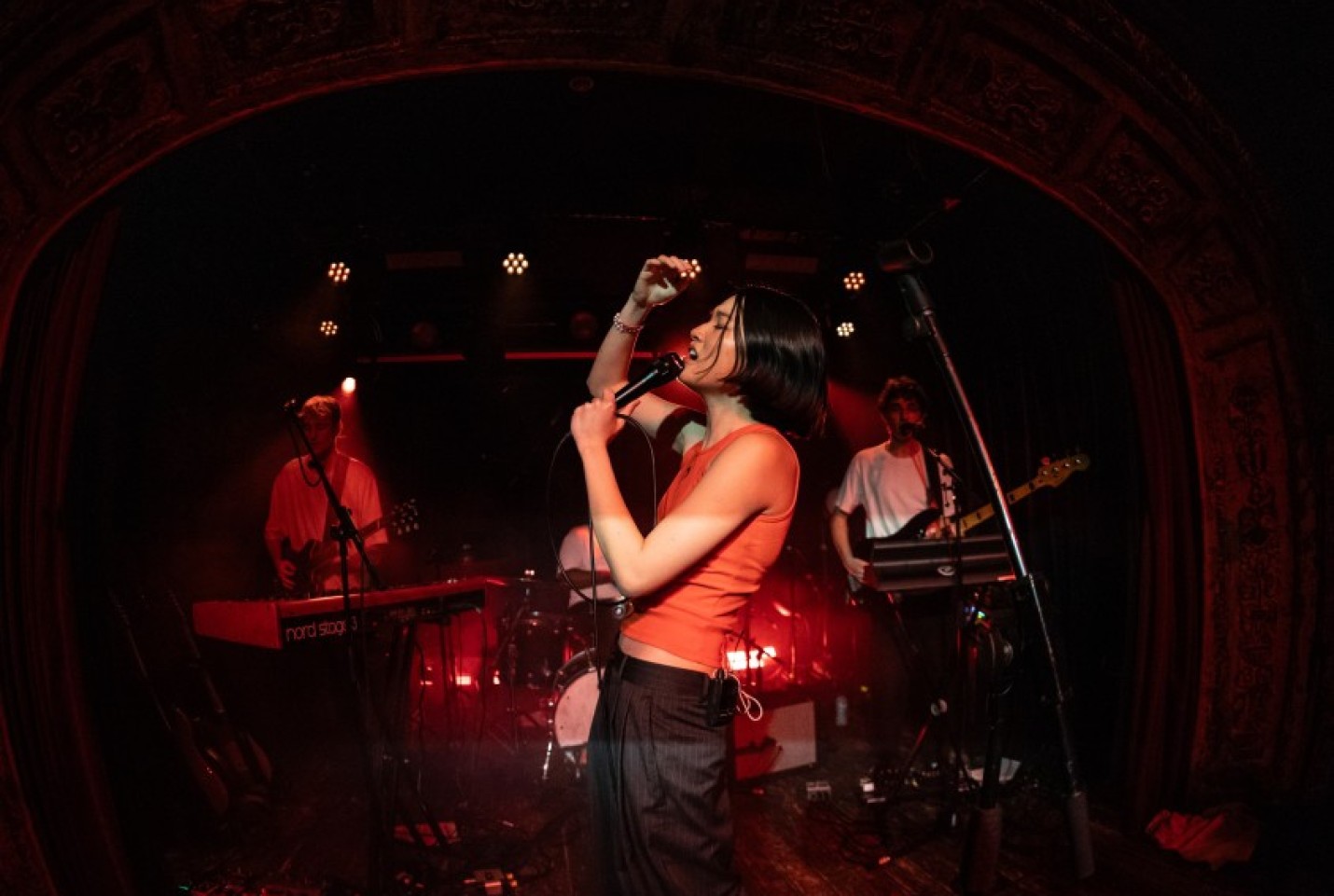 Chloe Quisha performing on stage.